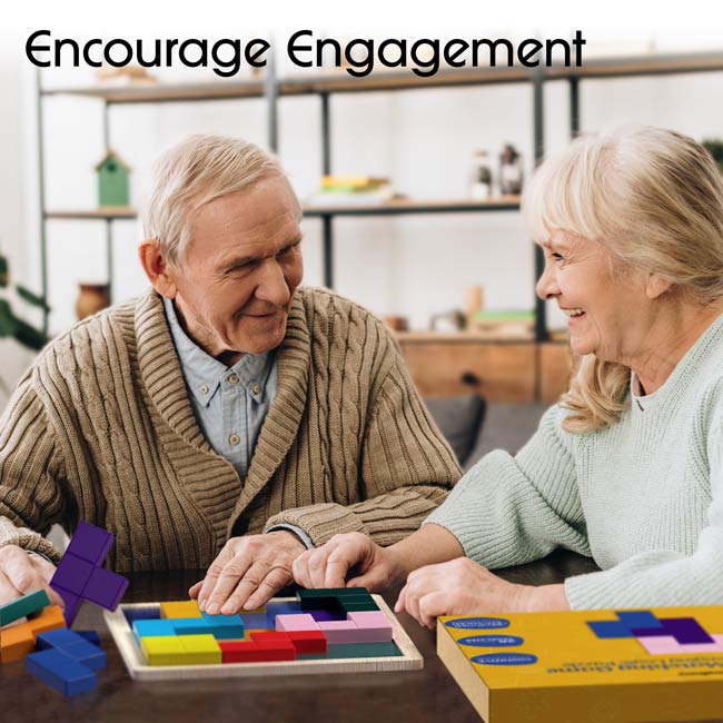 Two seniors smile at each other while they engage with the Keeping Busy Tile Matching Game for Seniors.
