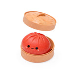 The red Mini Lucky Bao Mystery Squishy Dumpling.