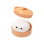 The white Mini Lucky Bao Mystery Squishy Dumpling.