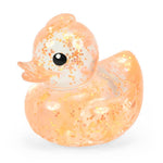 An orange glitter Stretchy Glow Duck.