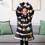 A child poses with their hands over their head while wearing the Kids Friends Forever Hideout Hoodie.