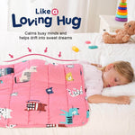 A child sleeps on their belly underneath the Kitties Weighted Cooling Lap Pad 2 lb.