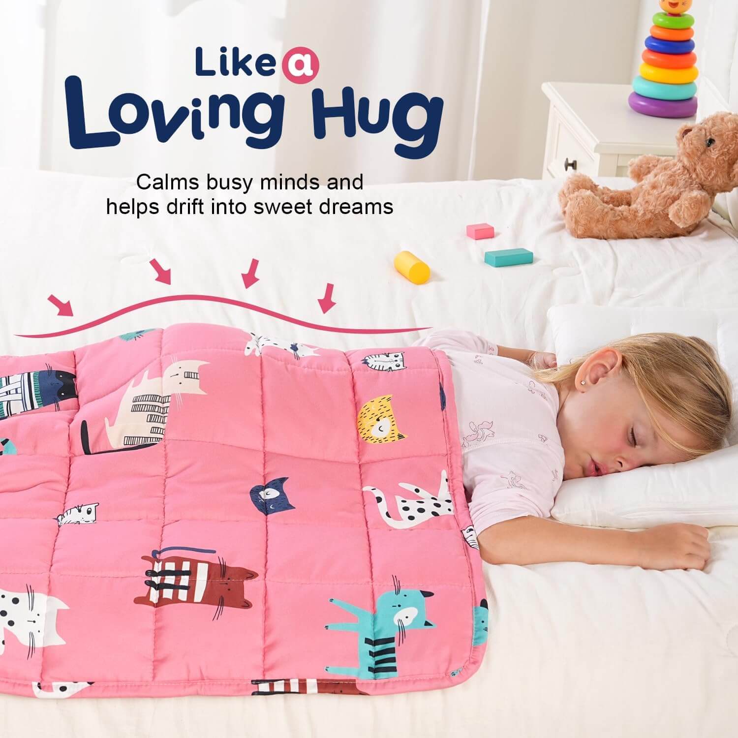 A child sleeps on their belly underneath the Kitties Weighted Cooling Lap Pad 2 lb.