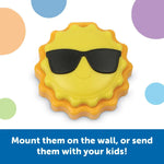 A plastic sun wearing sunglasses sits above text that reads: Mount them on the wall, or send them with your kids!