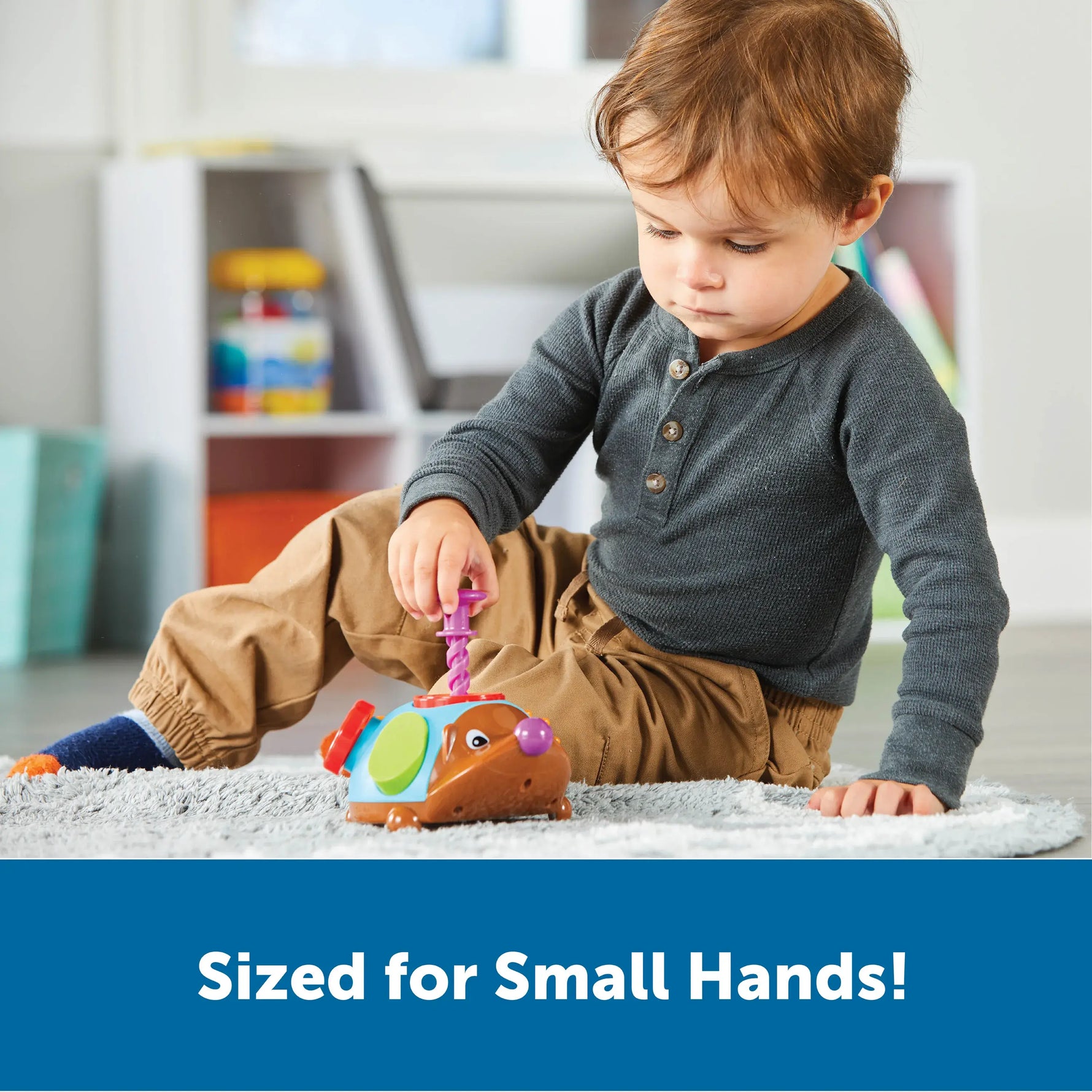 An infographic demonstrating that Spike the Fine Motor Hedgehog Fidget Friend is sized for small hands.