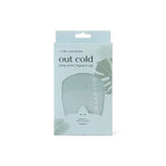 The teal Out Cold Temp-Smart Migraine Cap in the product box.