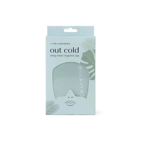 The teal Out Cold Temp-Smart Migraine Cap in the product box.