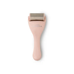 The pink Lemon Lavender Slow Your Roll Freezable Face Roller Massager.