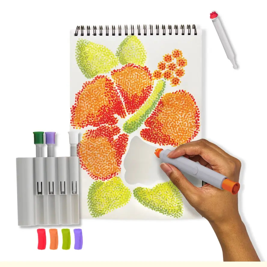 A hand fills in a petal on the Lifelines FlowArt Pogo-Dot Nature activity pad.