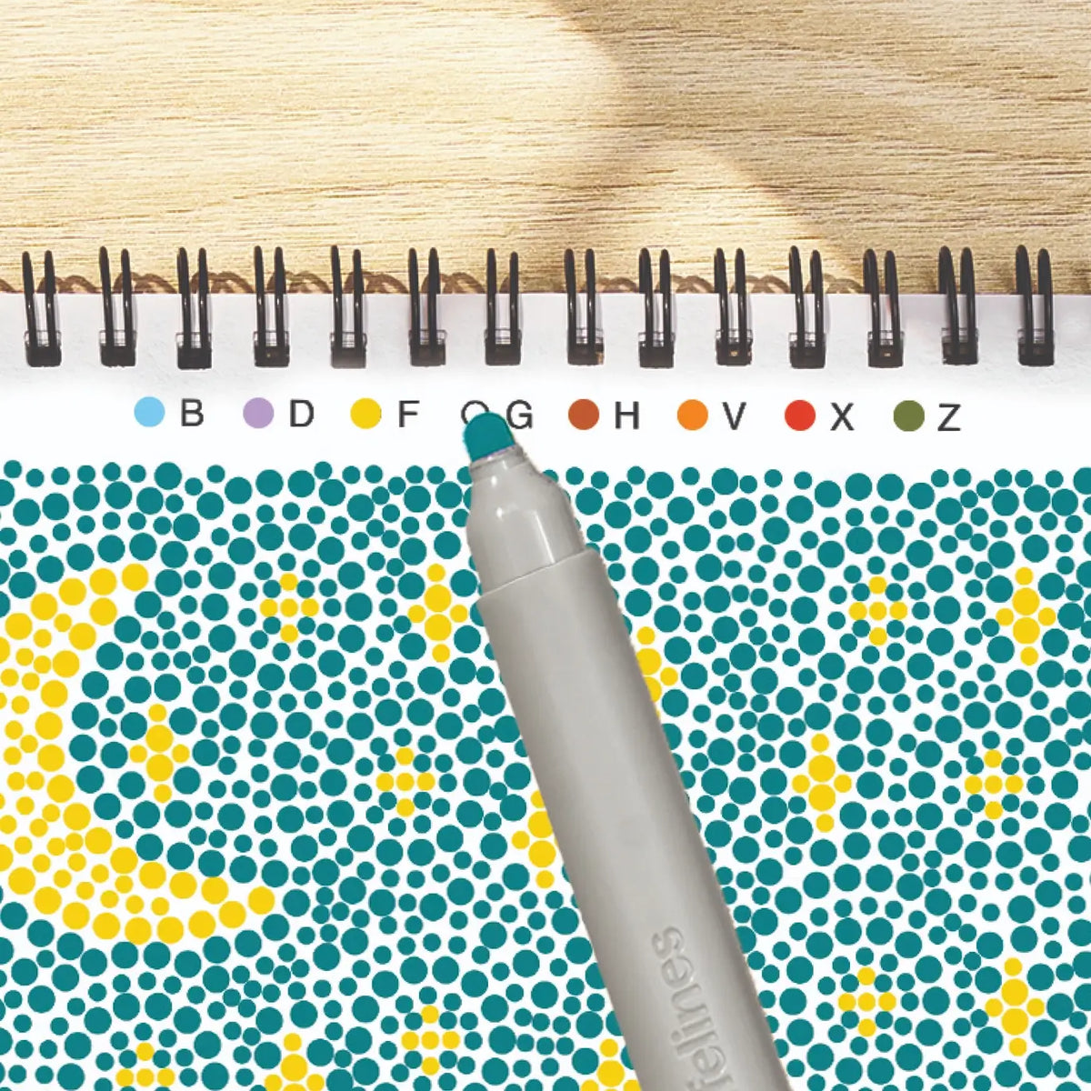An up close look at the color and letter guide in the FlowArt Dot-by-Letter Sweater Weather set.