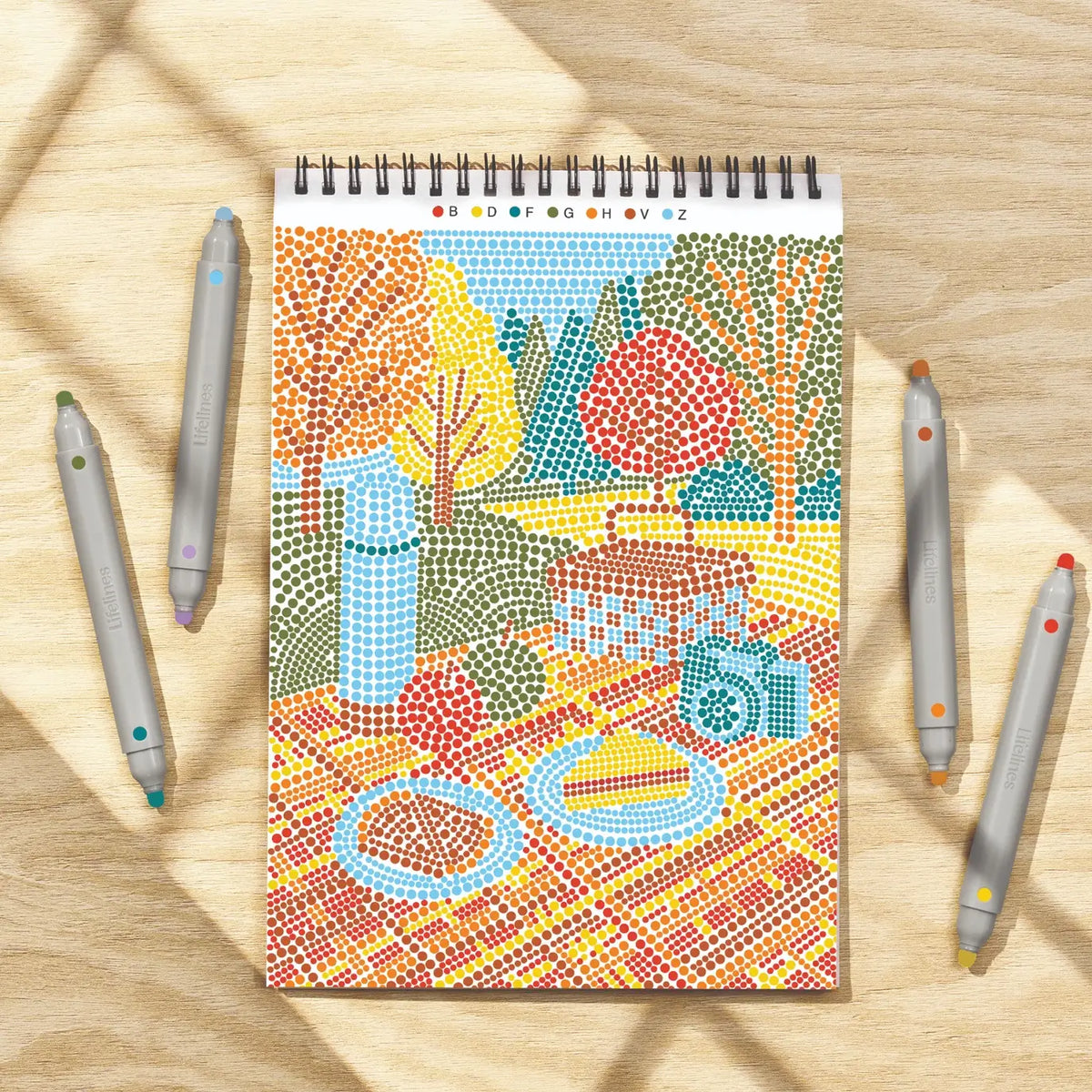 An autumn picnic scene in the FlowArt Dot-by-Letter Sweater Weather set.