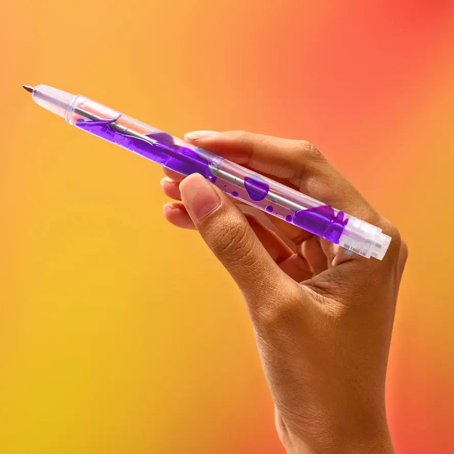 A hand positions the Secret Garden purple Scented Lava Gel Pen.