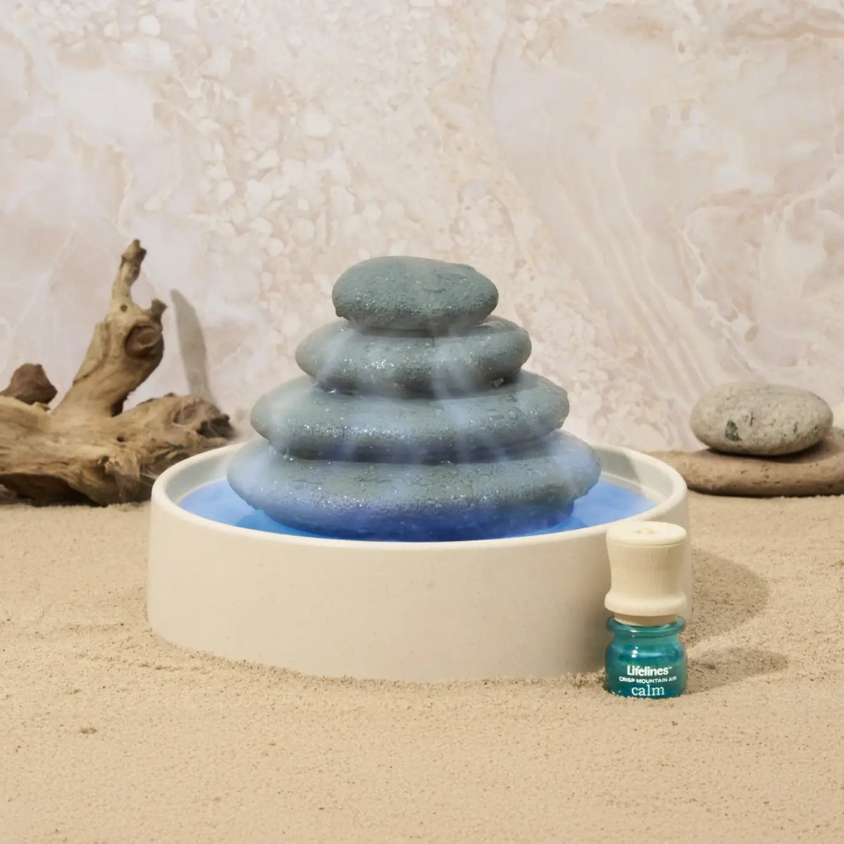 A desert scene with the Lifelines Stacking Stones Diffuser.