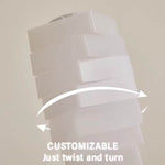 An infographic demonstrates how to twist the blocks to fully customize the lamp.