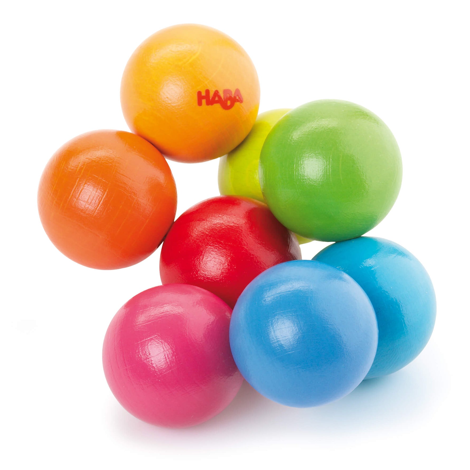 The colorful wooden balls of the Magica Wooden Grasphin and Teething Toy by HABA.