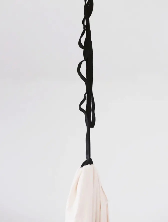 The Marlowe Extra Long Daisy Chain hanging a sensory swing.