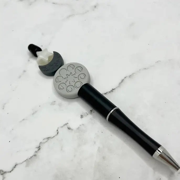 The Moon Phases Chewy Fidget Pen.