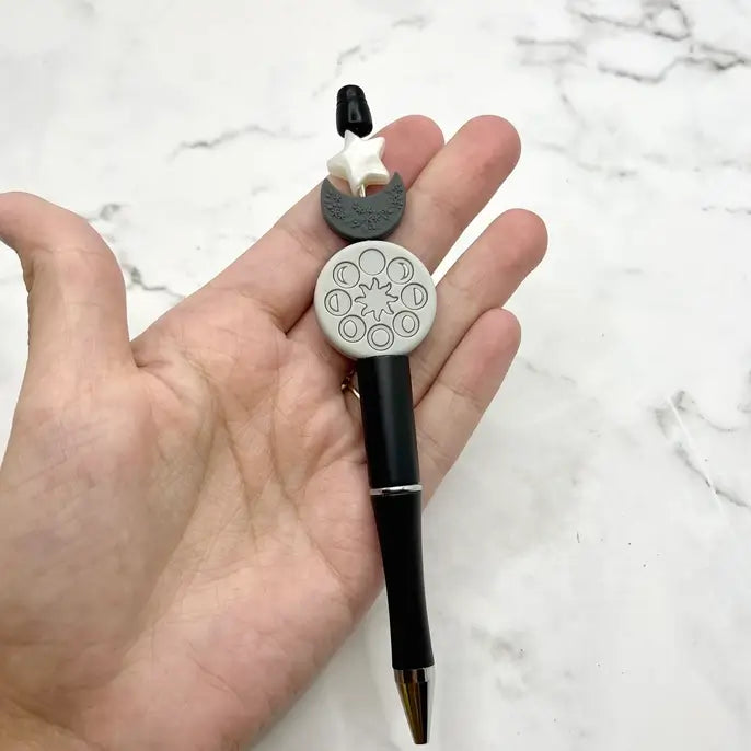 The Moon Phases Chewy Fidget Pen.