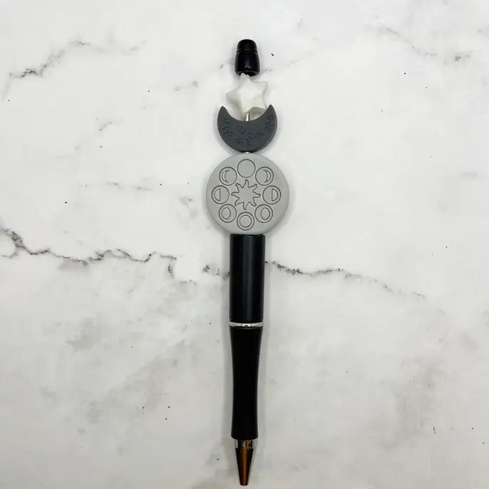 The Moon Phases Chewy Fidget Pen.