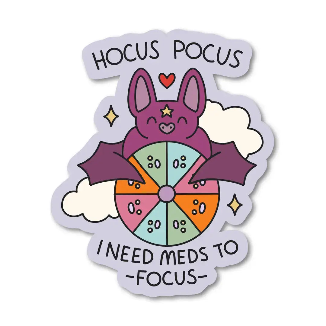 A bat holds a pill box and the text reads: Hocus Pocus I Need Meds to Focus.
