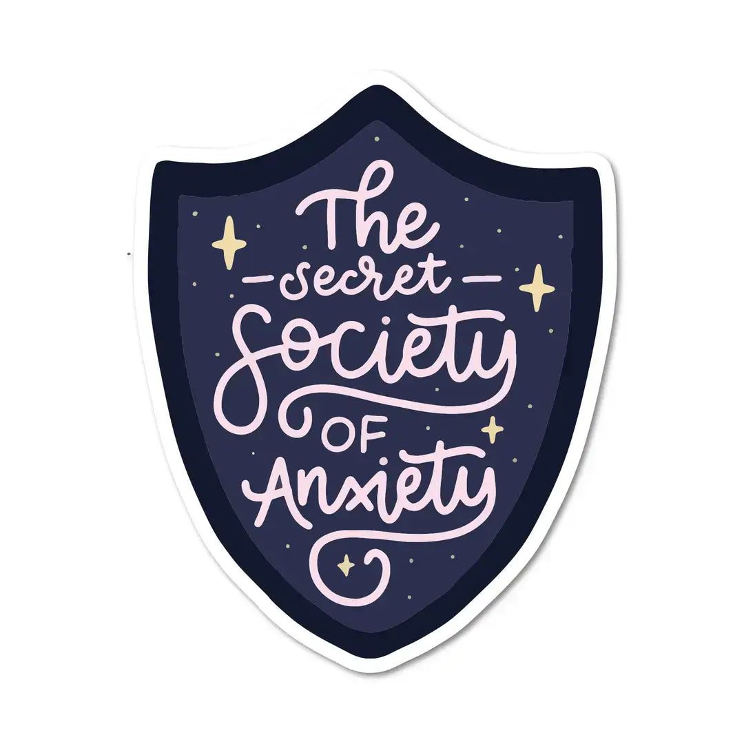 A sticker the shape of a shield reads: The Secret Society of Anxiety.