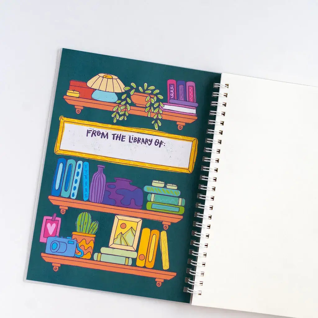 The cover of the Sticker Library is flipping open to reveal a page with a place to leave the owners name.