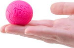 A hand holds up a hot pink soccer ball from the Teenie Nee Doh Hot Shots.