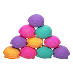 A colorful pyramid of the different colors and facial expressions of the Teenie Nee Doh Funky Pup.