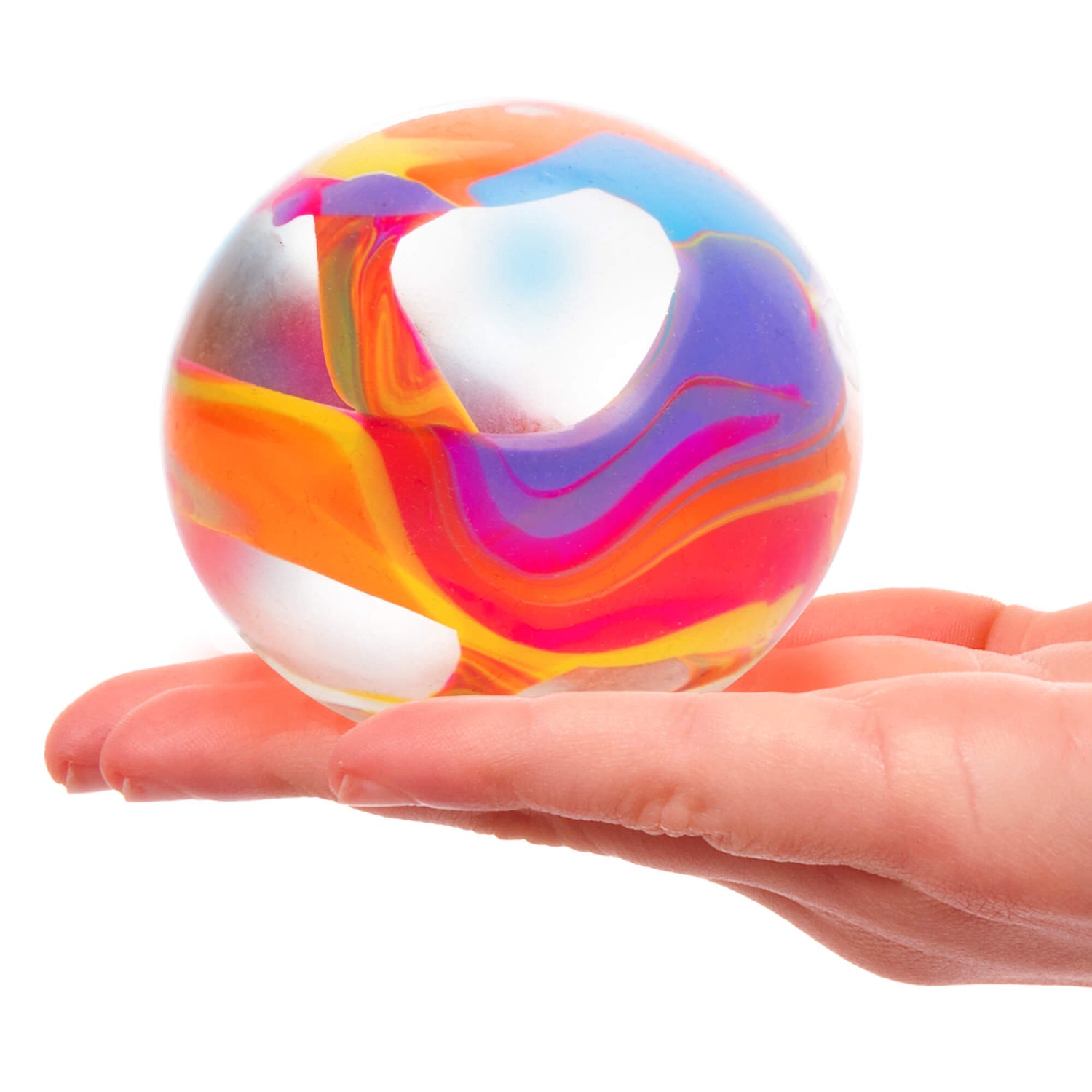A hand holds up a Marbleez.