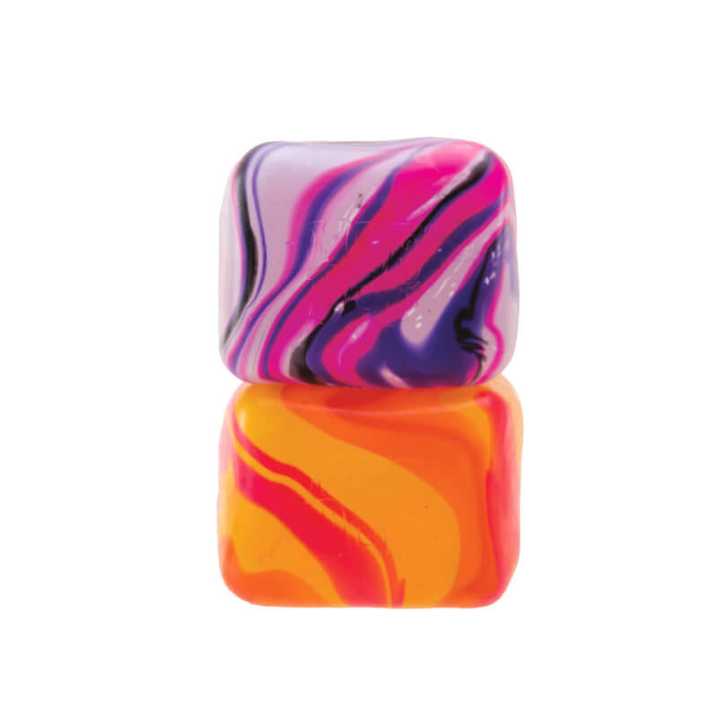 The pink NeeDoh Nice Cube Swirl stacked on the orange.