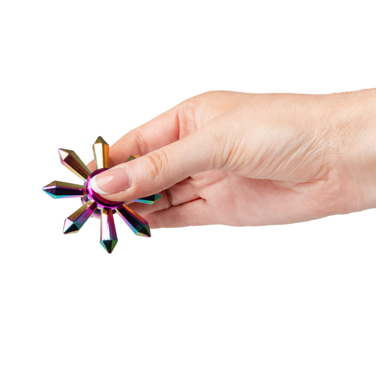 A hand holds the Fidgix Spinner.