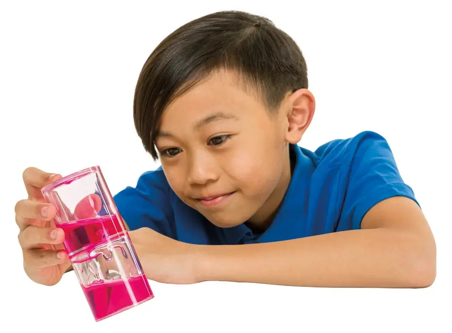 A child holds the neon pink Ooze Dribble Liquid Timer.