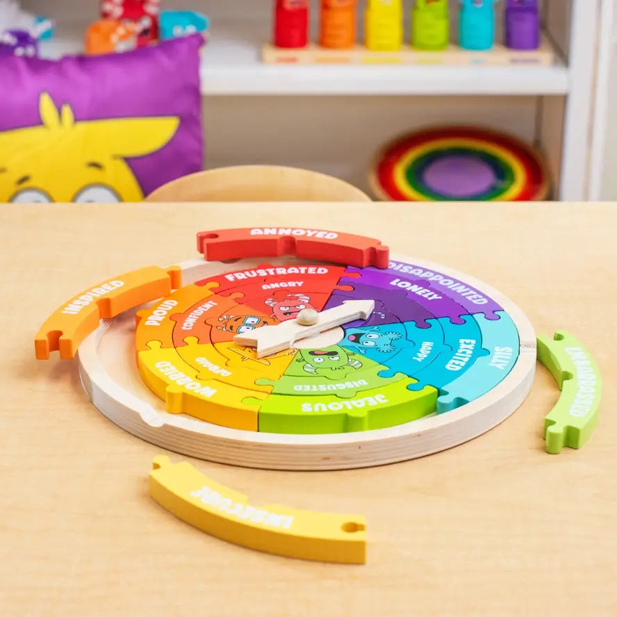 The My Emotions Wheel Puzzle with several pieces removed for play.