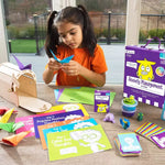 A child folds paper from the Anxiety Management in a Box.