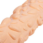 A close-up of the orange cones mat rolled up.