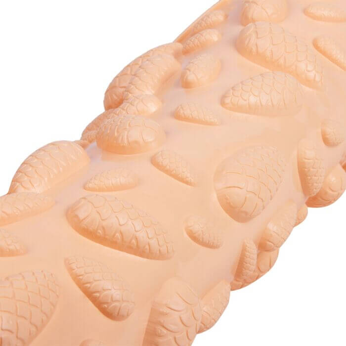 A close-up of the orange cones mat rolled up.