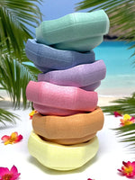 The Pastel Rainbow Stepping Stone Set with 6 pieces stacked askew.