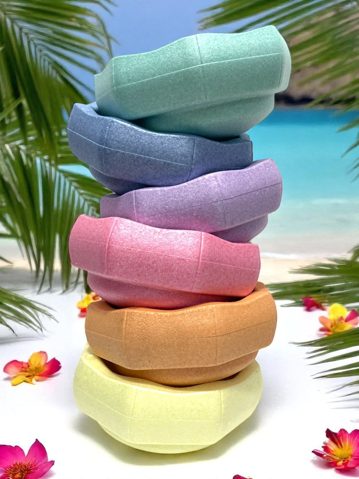 The Pastel Rainbow Stepping Stone Set with 6 pieces stacked askew.