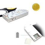 A close-up look at the headphone jack and battery compartment of the Roll-Up Electronic Drum Kit.