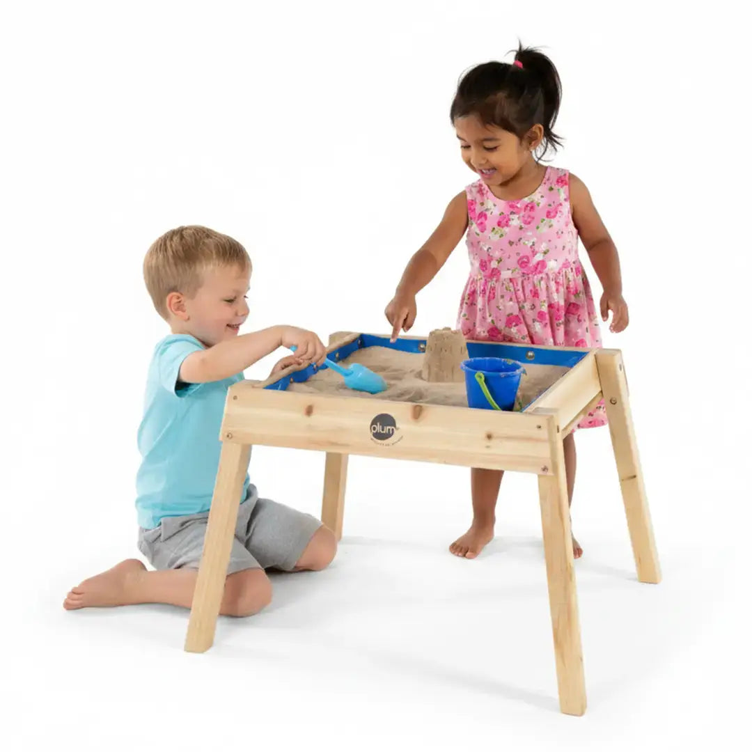 Two children play with sand in the Build and Splash Wooden and and Water Table.