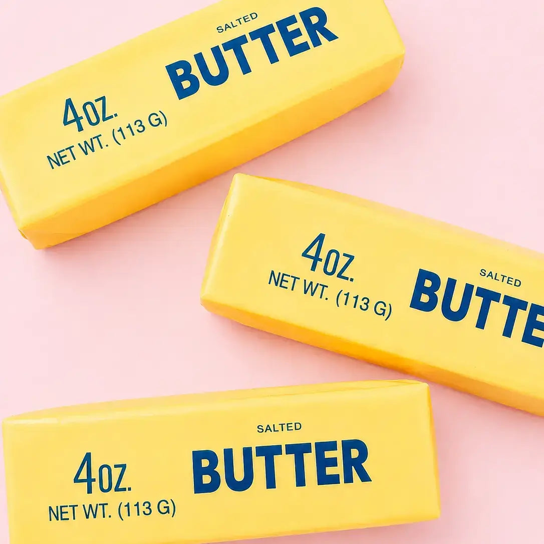 Three sticks of the Butter Me Up Slow Rise Squishy.