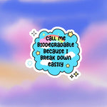 The blue Call Me Biodegradable Because I Break Down Easily 4" Vinyl Sticker on a pink and blue background.