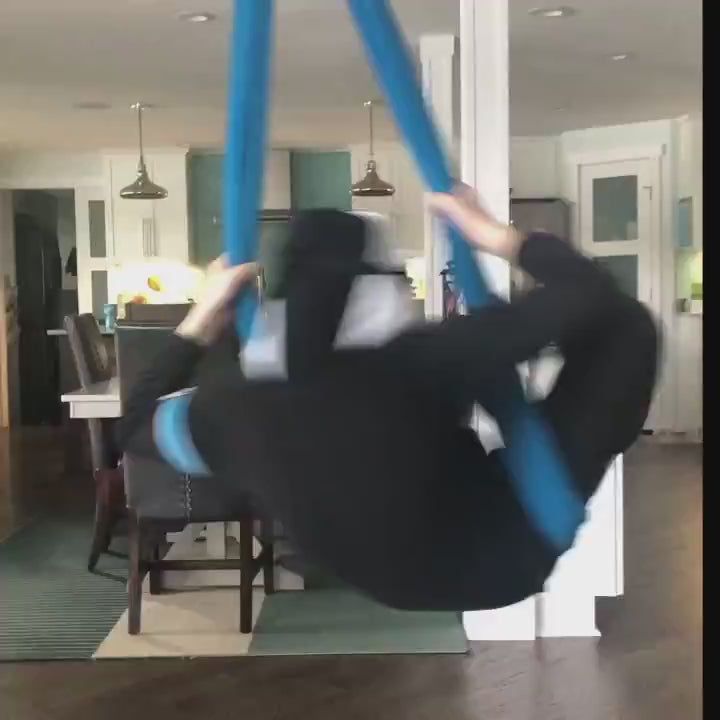 Child spinning in a swing with a mask on and then it falls off