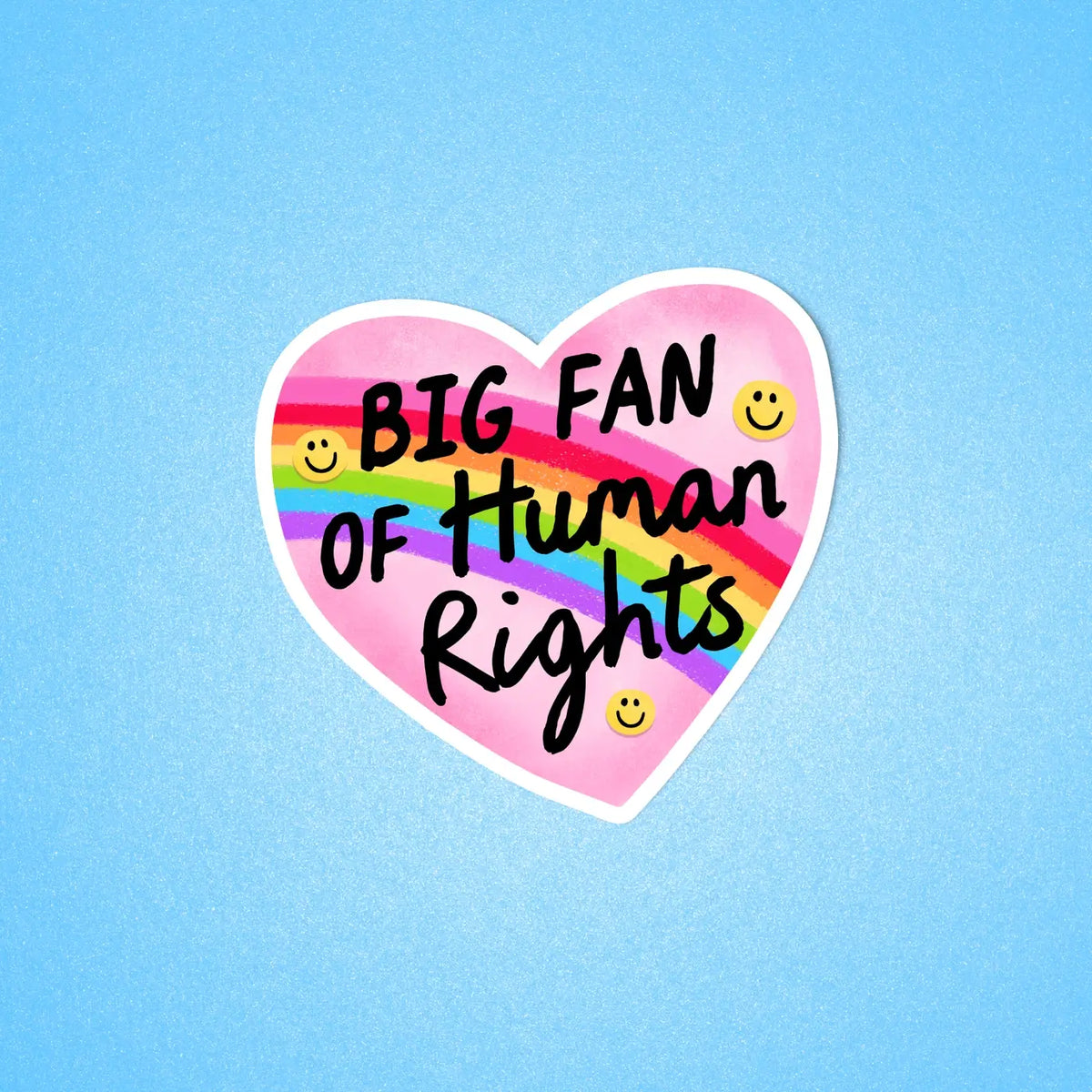 A sticker in the shape of a heart reads: Big Fan of Human Rights.