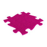 The pink grass in the Rainbow Sensory Playmat Set.