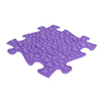 The purple pebbles mat in the Rainbow Sensory Playmat Set.