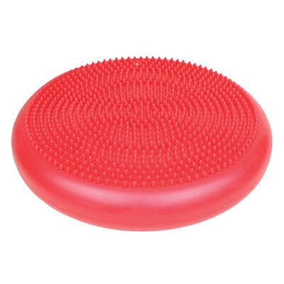 The nubby side of the red Inflatable Balance Disc.