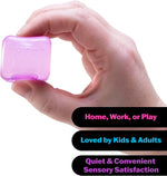 A hand holds the purple Nice Ice Baby.