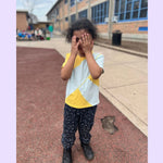 A child wears the constellation Youth Sensory Friendly Fidget Jogger.