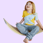 A child wears the grey Youth Sensory Friendly Fidget Jogger.